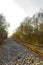 Train tracks through nature to infinity in Germany