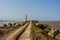 Train tracks between river and ocean