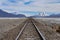 Train tracks running across the Salar de Chiguana in the Nor Lipez province, near Uyuni, Bolivia