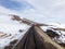 Train tracks on snowy landscape