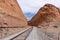 Train tracks surrounded by rock walls in Utah