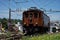 Train traveling along its railway tracks with electrical wires above, Olten, Switzerland