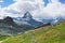 Train from Zermatt to Gornergrat moves on Matterhorn mountain background