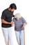 Trainer Assisting Senior Woman Holding Walking