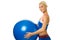 trainer holding a fitness ball