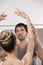 Trainer Teaching Ballet To Ballerina In Studio