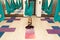 TRAINER YOGA WITH THE BOWL OF MEDITATION introduces his wards into a trance. fly yoga stretching exercises in gym. Fit and