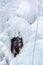 Training athletes at the winter ice climbing wall