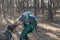 Training dogs for protective guard duty. A man is attacked by a large gray dog. Dog breed Cane Corso Italiano bite the hand