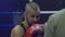 Training, portrait of beautiful boxer man in red gloves on the boxing ring with an opponent close up at sports club