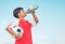 Training, sports and football with child drinking water for fitness, health or endurance exercise. Wellness, summer and