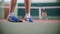 Training on the tennis court. Two young men playing tennis. Feet in focus