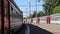 Trains and passengers at a Rizhsky Railway Station-- is one of the nine main railway stations in Moscow, Russia