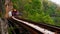 Trains running on railways track crossing kwai river