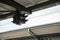 Trainstation roof abstract view with installations and cables