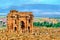 Trajan Arch within the ruins of Timgad in Algeria.