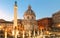 Trajan`s Column and The Church of the Most Holy Name of Mary at the Trajan Forum, Rome, Italy.