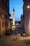 The Trajanâ€™s Column from via Magna Napoli in the night, Rome, Italy