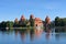 Trakai, Lithuania - August 2019: People visiting Trakai Island Castle on Lake Galve in Lithuania