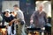 TRAKAI, LITHUANIA - JUNE 16, 2018: Historical reenactment activists preparing food over an open fire during annual Medieval