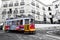 Tram 28 passing through Lisbon streets