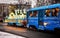 TRAM IN CHRISTMAS LIGHTS WITH CHRISTMAS DEER ON THE CITY STREET