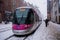 Tram during heavy snowfall in Birmingham, United Kingdom