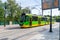 Tram at Most teatralny tram stop . Green and yellow tram.