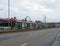 A tram waiting at a stop with people getting of at Cleveleys town center in Blackpool Lancashire