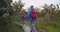 Tramping New Zealand - Couple Hiking Wearing Backpacks on Routeburn Track