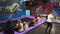 Trampoline entertaining game center. A day off, a crowd of children and parents having fun jumping on trampolines
