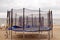 Trampolines on beach sea sand. Active recreation.