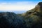 Tramuntana near Sa Calobra, lone house in the mountains at sunset, rocks, green pastures, mediterranean sea, blue sky, Mallorca,