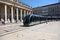 Tramway passing in front of ancient theater