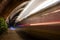 Tramway Tunnel at Night with Tram Light Trails