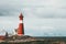 Tranoy Lighthouse Norway Landscape sea and mountains on background Travel scenery scandinavian