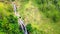 Tranquil Aerial Footage Unveiling the Gentle Cascade of a Long Waterfall on the Hill, Taken from a Considerable Distance