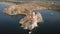 Tranquil Aerial View of the Baikal Bay Shamanka. White ship in calm bay at great lake. Olkhon Island, Baikal, Russia