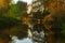 Tranquil autumn river with colorful reflections