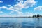 Tranquil autumn scene with a pristine blue sky and drifting clouds