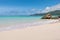 Tranquil bay with white sand, blue skies, granite stones and turquoise sea at Fairyland Beach, Seychelles Africa.