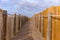 Tranquil Coastal Path with Wooden and Rope Fence at Beach, Guinch, Cabo da Roca.