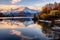 Tranquil European Lake: Serene Reflections of Snow-Capped Alps