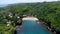 Tranquil hidden tropical cove, Gesing Beach Indonesia, aerial panorama