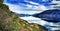 Tranquil landscape with a mirror lake and mountain range on New Zealand's South Island.