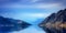 Tranquil landscape with a mirror lake and mountain range on New Zealand's South Island.