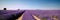 A tranquil lavender field in full bloom, gently swaying in the breeze under a clear blue sky, concept of Serenity in
