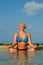 Tranquil Meditating Woman In Pool in Paradise