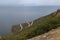Tranquil Mediterranean landscape: coast, cliff, sea, sky, water