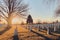 Tranquil military graveyard: An image portraying the tranquility of an army cemetery bathed in sunlight, with well